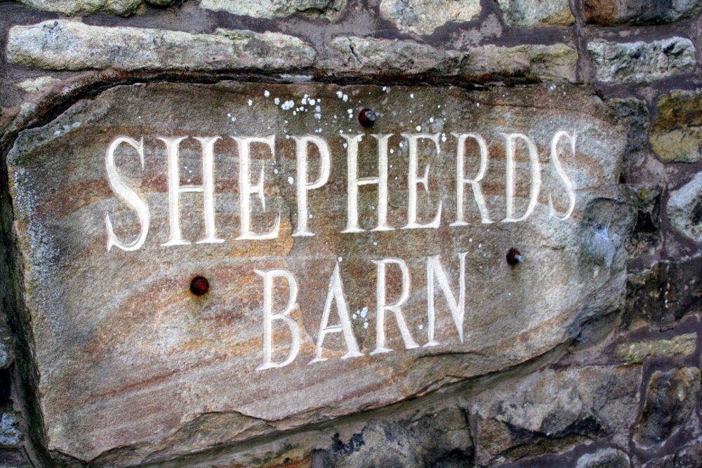 https://placestostayblackpool.co.uk/wp-content/uploads/2025/10/shepherds-barn-sign-010241.jpg
